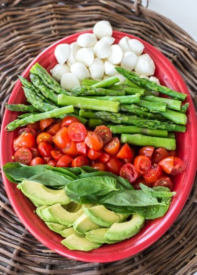 Asparagus, Tomato and Avocado Salad in a creamy lemon vinaigrette! Healthy, quick and delicious! The perfect low carb summer salad!