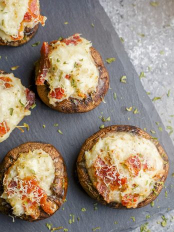 These Crab and Bacon Stuffed Mushrooms are packed with creamy cheese, salty bacon and lumps of crab meat. The perfect low carb, keto, five ingredient appetizer! 
