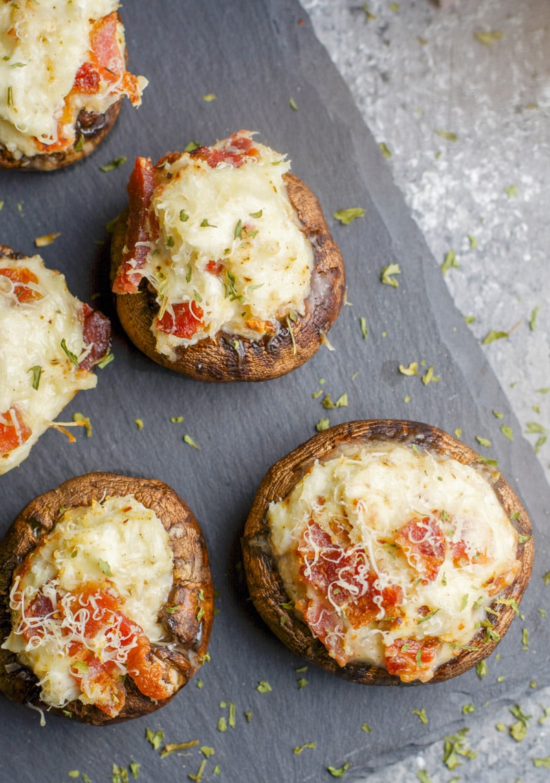 These Crab and Bacon Stuffed Mushrooms are packed with creamy cheese, salty bacon and lumps of crab meat. The perfect low carb, keto, five ingredient appetizer! 