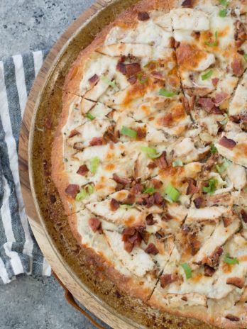 This easy Keto Chicken Bacon Ranch Pizza has a perfectly crispy low carb crust and is loaded with grilled chicken and bacon! Only 3 net carbs per slice!