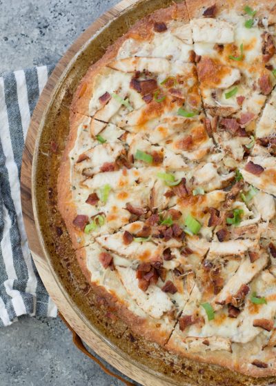 This easy Keto Chicken Bacon Ranch Pizza has a perfectly crispy low carb crust and is loaded with grilled chicken and bacon! Only 3 net carbs per slice!