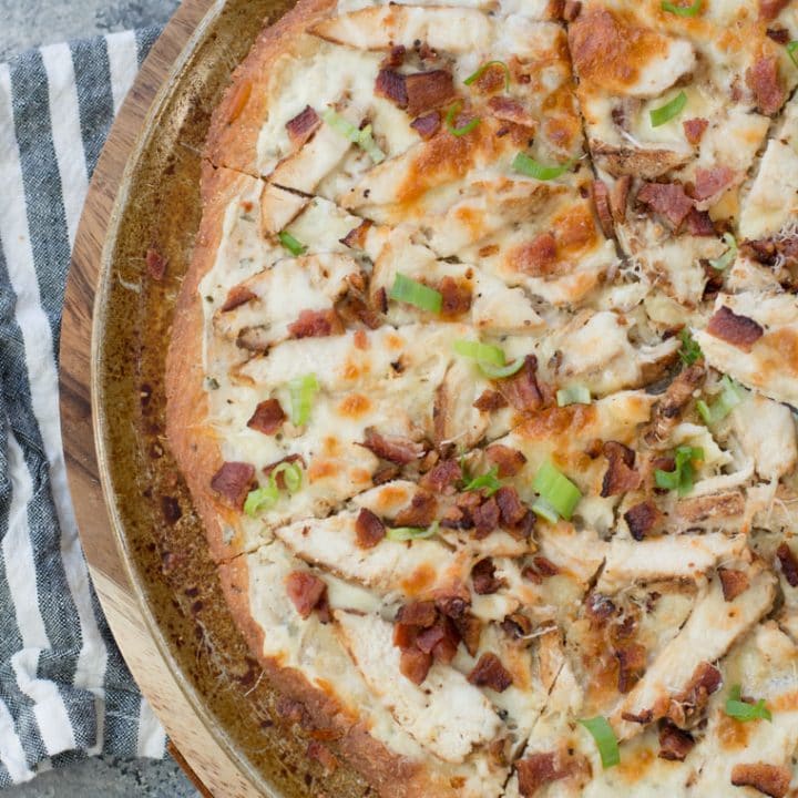 This easy Keto Chicken Bacon Ranch Pizza has a perfectly crispy low carb crust and is loaded with grilled chicken and bacon! Only 3 net carbs per slice!