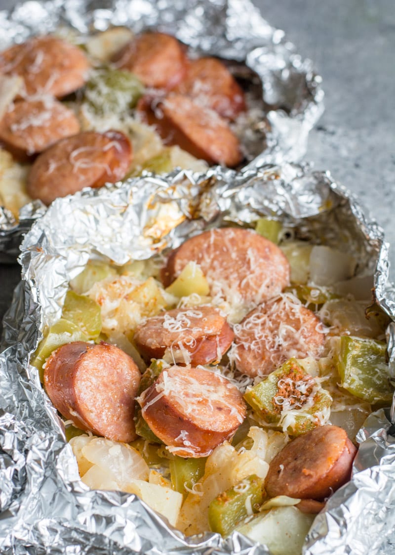 Two cabbage with sausage foil packs. 