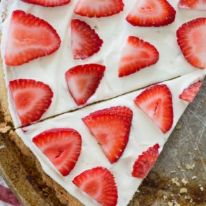  This Strawberry Limeade Keto Fruit Pizza features a sweet almond flour cookie crust, a refreshing lime frosting and a sweet strawberry topping! The perfect low carb dessert for all of your summer cookouts!  