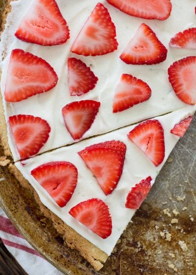  This Strawberry Limeade Keto Fruit Pizza features a sweet almond flour cookie crust, a refreshing lime frosting and a sweet strawberry topping! The perfect low carb dessert for all of your summer cookouts!  