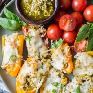 Keto Pesto Chicken Stuffed Sweet Peppers, a simple FOUR ingredient dinner that is healthy and gluten free! #keto