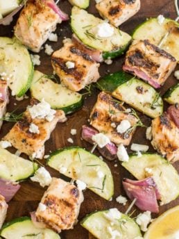 These Grilled Salmon Kabobs with Greek Marinade are loaded with lemon and garlic flavor! This shop has been compensated by Collective Bias, Inc. and its advertiser. All opinions are mine alone. #MarinadesWithMazola #MakeItWithHeart #CollectiveBias #ad