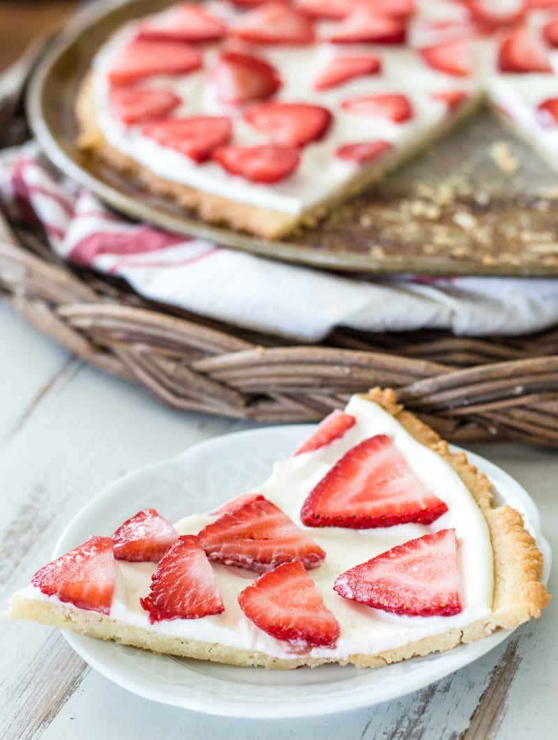  This Strawberry Limeade Keto Fruit Pizza features a sweet almond flour cookie crust, a refreshing lime frosting and a sweet strawberry topping! The perfect low carb dessert for all of your summer cookouts!  