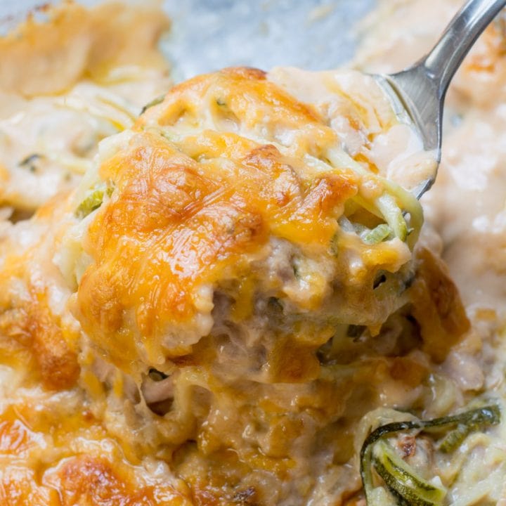 This Keto Tuna Zoodle Casserole is the perfect low carb comfort food! This dish is only 3.4 net carbs and packed with zucchini noodles, a creamy cheese sauce and chunks of tuna. #keto