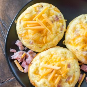 Try these Keto Ham Egg and Cheese Muffins for the ultimate low carb grab and go breakfast! At only one net carb each these muffins are perfect for keto meal prep! #keto #mealprep