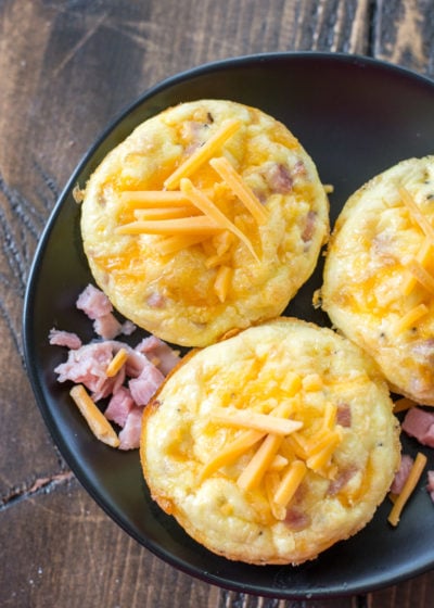 Try these Keto Ham Egg and Cheese Muffins for the ultimate low carb grab and go breakfast! At only one net carb each these muffins are perfect for keto meal prep! #keto #mealprep