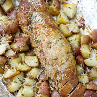 This easy Grilled Herb Crusted Potatoes and Pork Tenderloin Foil Packet is an effortless Summer meal perfect for busy weeknights!