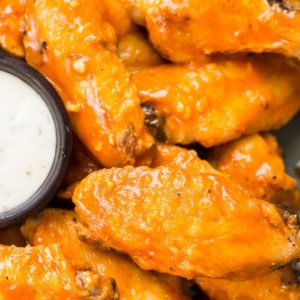 These Air Fryer Buffalo Wings are ultra crispy with no breading! These wings are the perfect low carb game day snack complete with a spicy, buttery buffalo sauce! #keto #lowcarb