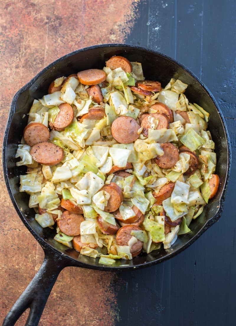 close up of keto cabbage and sausage in a skillet 