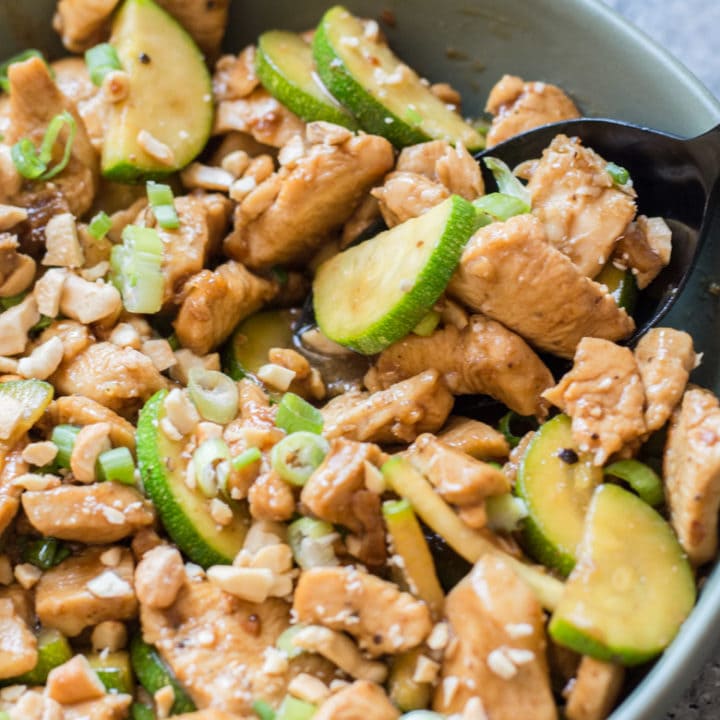 This Keto Sesame Chicken Stir Fry features thinly sliced chicken and zucchini with a rich Asian sauce. At just 2 net carbs per serving and ready in 30 minutes this is the ultimate easy low carb meal! #keto
