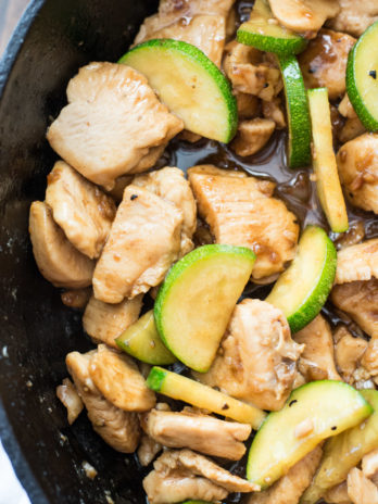 This Keto Sesame Chicken Stir Fry features thinly sliced chicken and zucchini with a rich Asian sauce. At just 2 net carbs per serving and ready in 30 minutes this is the ultimate easy low carb meal! #keto