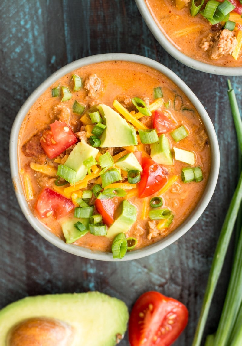 This Cheesy Keto Taco Soup is loaded with Mexican flavor and none of the carbs! At less than 6 net carbs per serving this no bean, low carb soup will be your new favorite! #keto