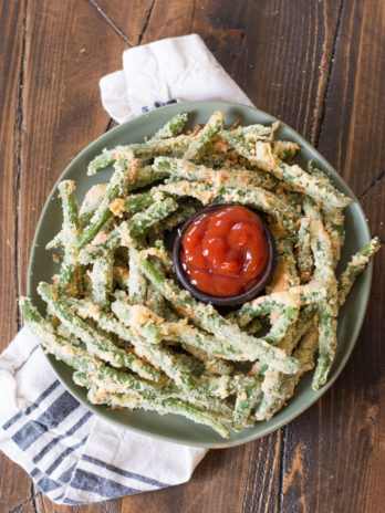 Are you looking for a crispy, salty snack? These easy Green Bean Fries are the perfect low side dish or appetizer! Under 6 net carbs per serving!