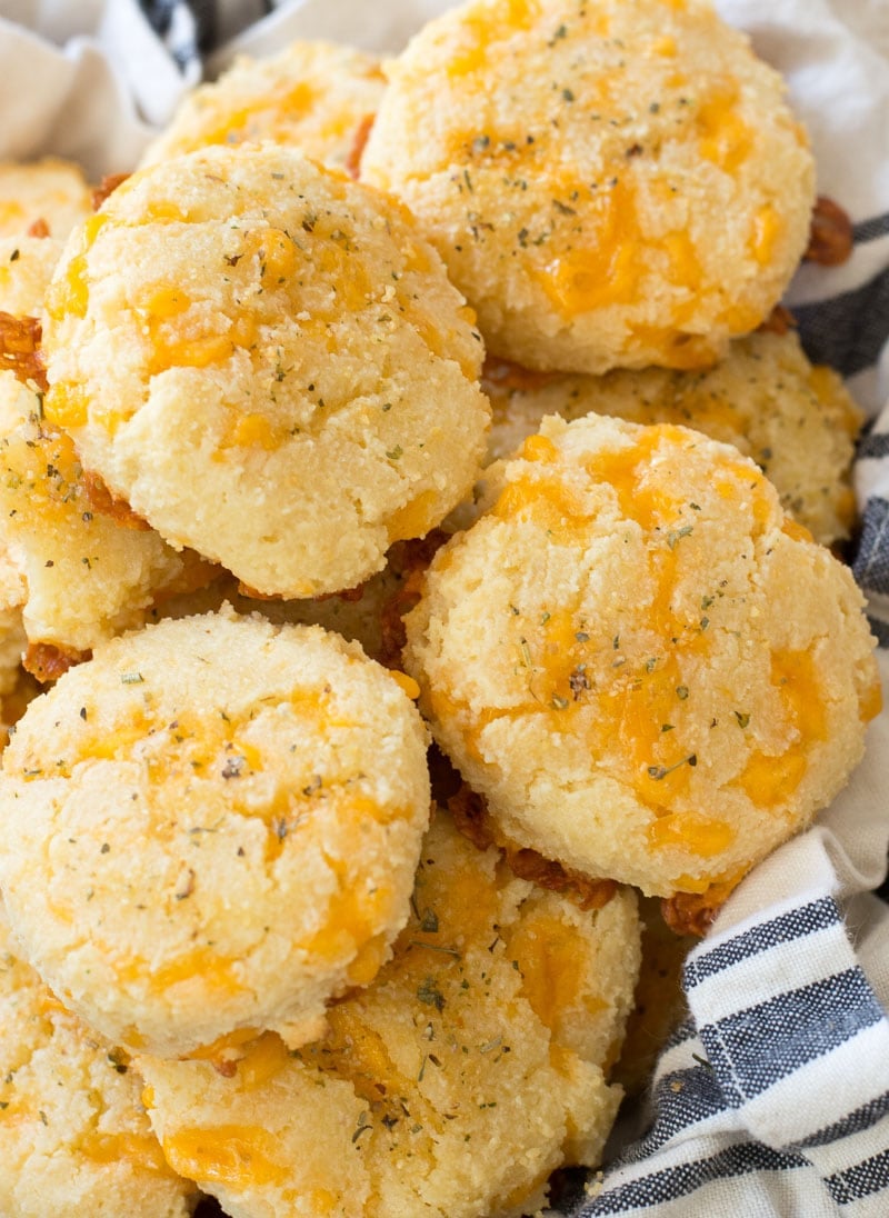 close up of a pile of keto cheddar bay biscuits