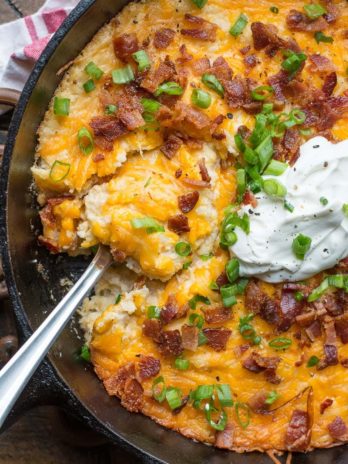 If you need a cheesy, low-carb side dish, this Bacon Cheddar Cauliflower Bake is packed with everything you love in a baked potato, but without the carbs! 