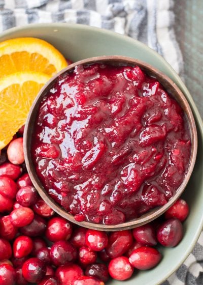 This easy three ingredient Low Carb Cranberry sauce is essential for your keto holiday spread! Learn how to make small batch, large batch and three different flavors with this easy guide. #keto