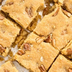 These Keto Butter Pecan Blondies are loaded with rich butter, vanilla and pecans! This is the perfect low carb dessert at about 2.5 net carbs per slice!  #keto