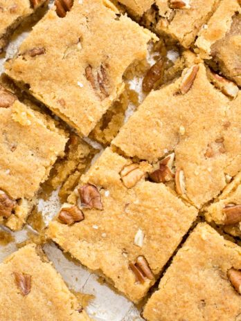 These Keto Butter Pecan Blondies are loaded with rich butter, vanilla and pecans! This is the perfect low carb dessert at about 2.5 net carbs per slice!  #keto