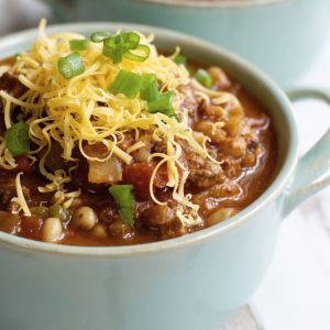 This Cabbage and Black-Eyed Pea Soup is the perfect slow cooker soup recipe for New Year's Day! Packed with black-eyed peas, onions, bell pepper, cabbage, and tomatoes for an easy, comforting soup.