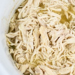 This easy all purpose Slow Cooker Shredded Chicken only requires a few ingredients and makes the best shredded chicken! Perfect for meal prep, casseroles, wraps and more! 