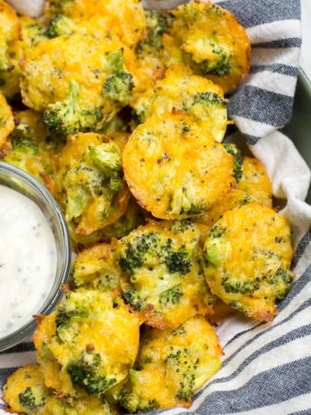 3 cups lightly steamed and chopped broccoli 1 ounce cream cheese, softened 1 1/2 cup cheddar 1/2 cup parmesan 1/2 teaspoon garlic powder 1/4 teaspoon salt 1/4 teaspoon pepper 2 eggs, beaten 2 tablespoons coconut flour