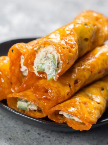 These Keto Jalapeño Popper Taquitos are loaded with fresh jalapeños and bacon! This is the easiest keto appetizer ever and under three net carbs per serving!