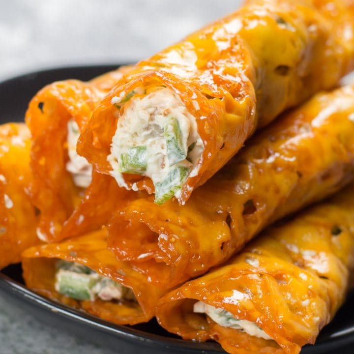 These Keto Jalapeño Popper Taquitos are loaded with fresh jalapeños and bacon! This is the easiest keto appetizer ever and under three net carbs per serving!