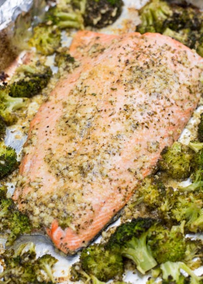 This easy Keto Garlic Butter Salmon and Broccoli Sheet Pan Dinner  is ready in 20 minutes. Packed with heart healthy fat and flavor this dish only has 5 net carbs per serving!