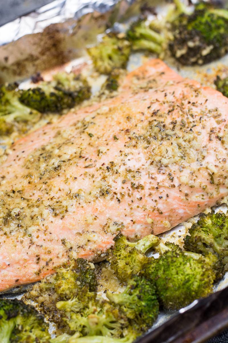 This easy Keto Garlic Butter Salmon and Broccoli Sheet Pan Dinner  is ready in 20 minutes. Packed with heart healthy fat and flavor this dish only has 5 net carbs per serving!