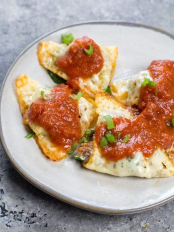 This easy four ingredient Keto Ravioli is loaded with sausage and spinach and only has 1.3 net carbs per serving! #keto