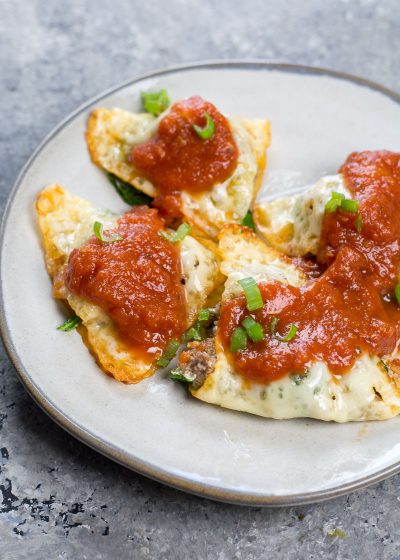 This easy four ingredient Keto Ravioli is loaded with sausage and spinach and only has 1.3 net carbs per serving! #keto