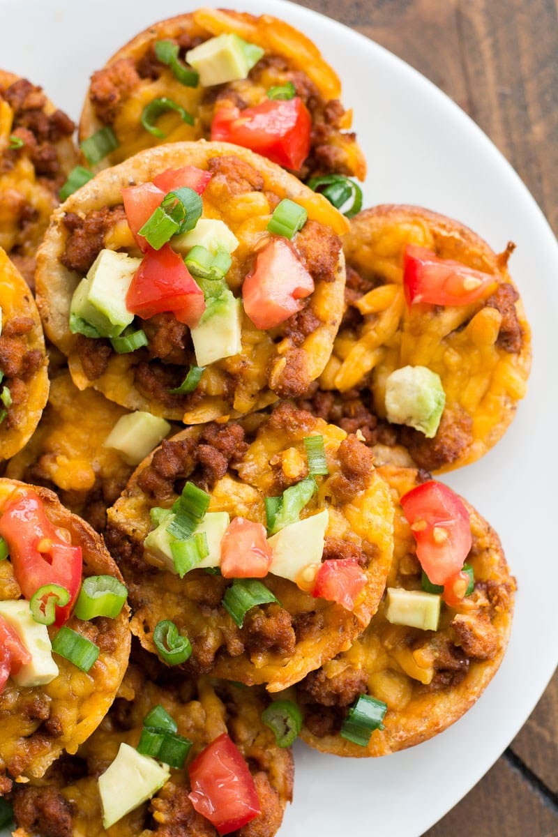 These easy Keto Taco Cups are made with low carb fat head dough, seasoned taco meat and cheddar cheese! Each cup is less than 2 net carbs and loaded with taco flavor!