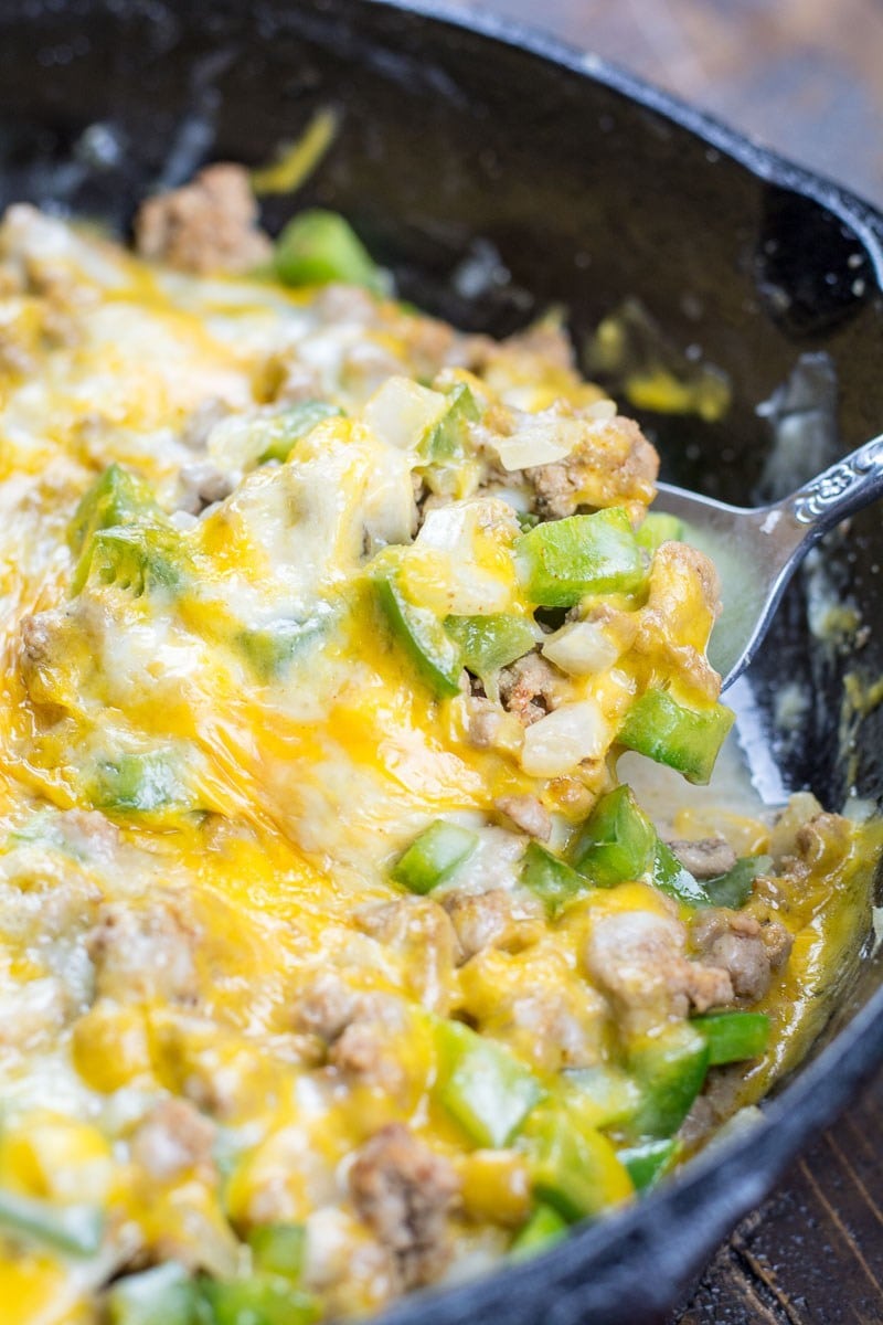 Try this easy One Pan Keto Philly Cheesesteak Skillet for an easy low carb dinner! This 20 minute meal is under 5 net carbs and loaded with ground beef, onions, peppers and cheese!