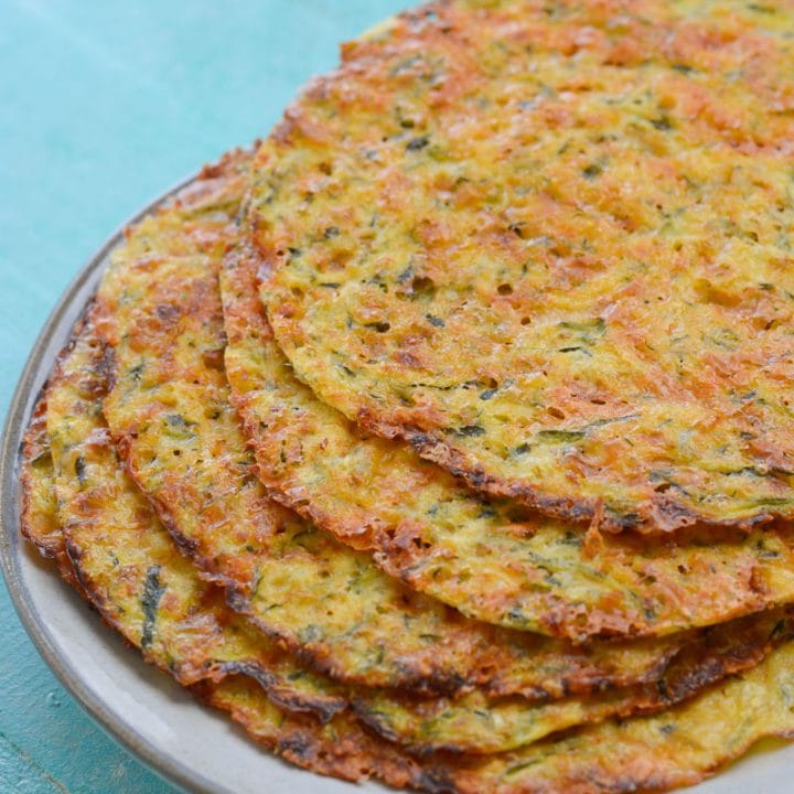 These easy five ingredient Zucchini Tortillas are low carb, grain free and keto friendly! At about one net carb per tortilla these are perfect for keto wraps, quesadillas and more!