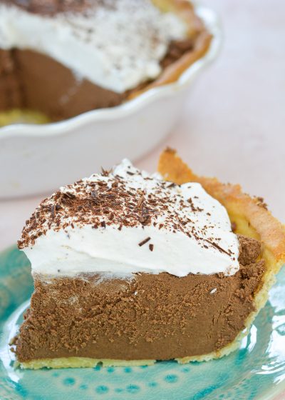 Try this Keto French Silk Pie for a decadent low carb dessert! At about 5 net carbs per slice this rich chocolate pie is an instant keto classic!