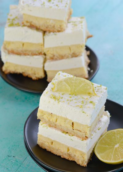 These delightful Keto Key Lime Bars feature a shortbread cookie crust, tangy lime bar layer topped with creamy lime whipped cream! At about 3 net carbs per bar this is a sweet treat that fits within your keto diet!