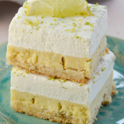These delightful Keto Key Lime Bars feature a shortbread cookie crust, tangy lime bar layer topped with creamy lime whipped cream! At about 3 net carbs per bar this is a sweet treat that fits within your keto diet!