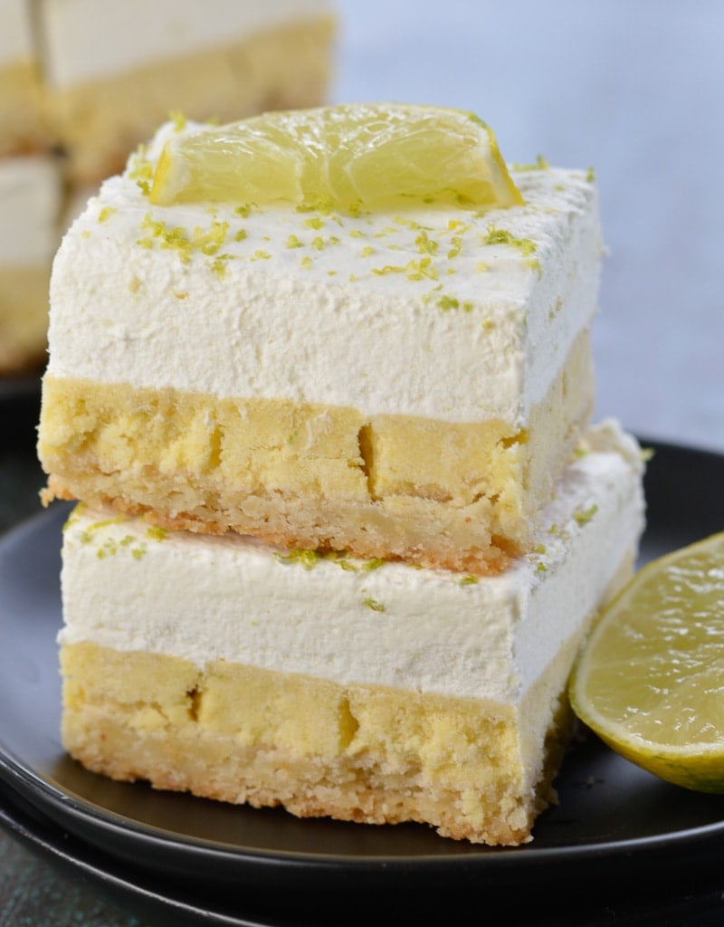 Two keto key lime bars stacked on top of each other. 