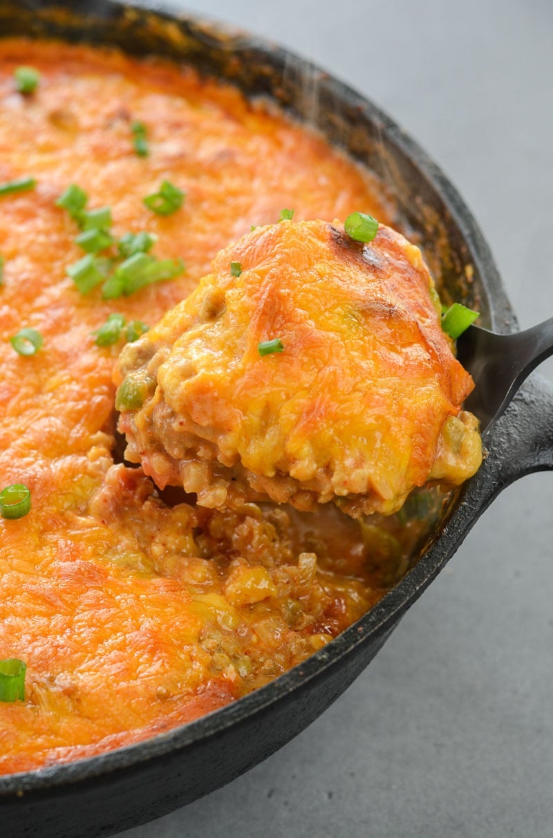 This Easy Keto Taco Skillet is packed with taco meat, cauliflower rice, vegetables and cheese. This is perfect for keto lunch meal prep or a quick and easy dinner around 6 net carbs per serving!