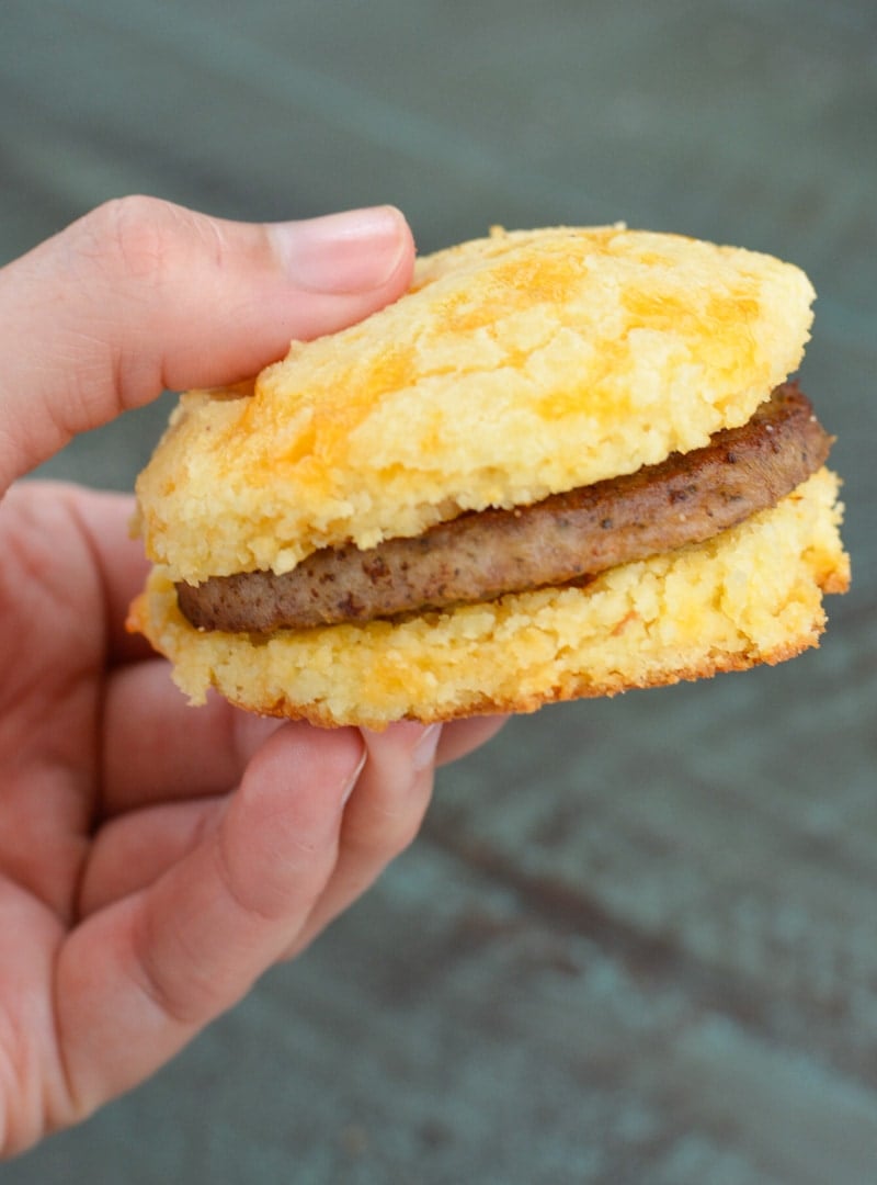 Try this Keto Sausage and Biscuit Recipe for an easy low carb breakfast! These Keto Almond Flour Biscuits are stuffed with cooked sausage patties for a high protein low carb breakfast!