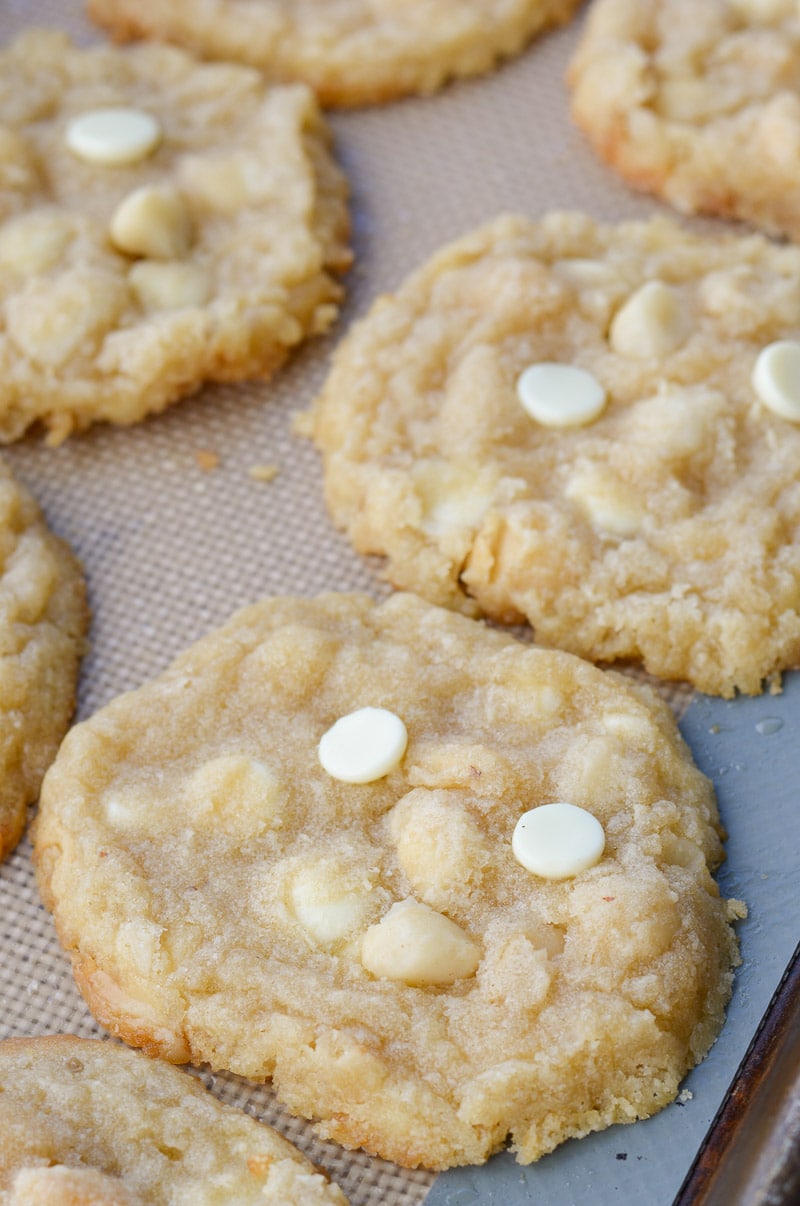 keto white chocolate macadamia nut cookies on a baking sheet