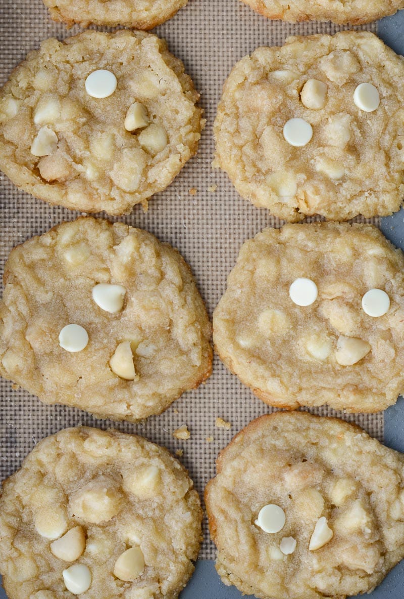 overhead view of keto white chocolate macadamia nut cookies on a baking sheet 
