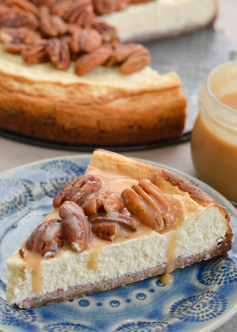 This rich Keto Butter Pecan Cheesecake is an incredibly decadent low carb dessert! With a delicious pecan crust, creamy cheesecake, keto caramel sauce and roasted pecans, you would never guess this is just 3.5 net carbs per slice!