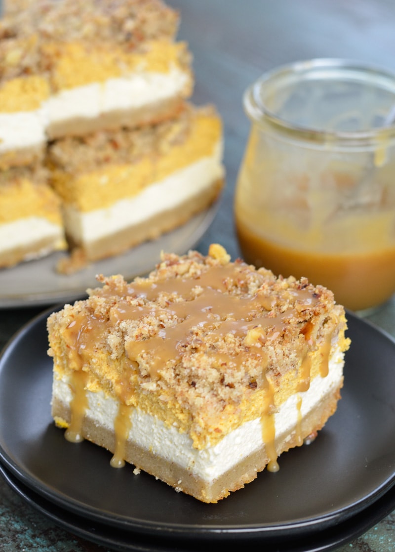 pumpkin cheesecake bars drizzled with caramel