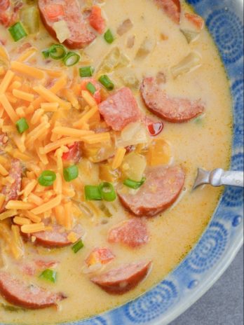 This Cheesy Smoked Sausage Soup is loaded with spicy sausage, tender vegetables in a creamy, cheesy sauce! At less than 7 net carbs per serving this is a great low carb, keto-friendly soup!